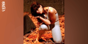 Woman dancing in the autumn leaves